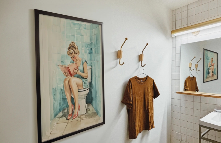 woman on toilet wall art