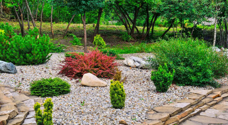 Front yard with stone and gravel mix