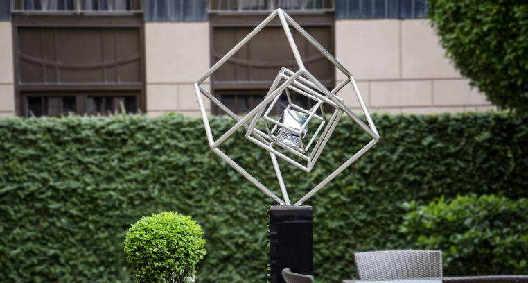 Front yard with modern sculptures