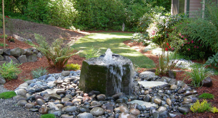 Front yard with creative water features