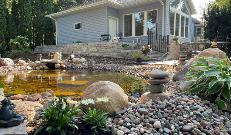 Front yard with small garden ponds