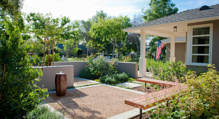 Front yard with modern garden benches