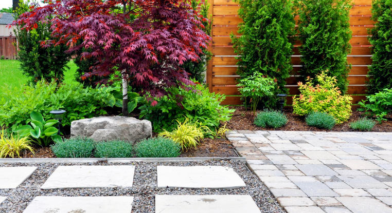 Front yard with decorative garden stones
